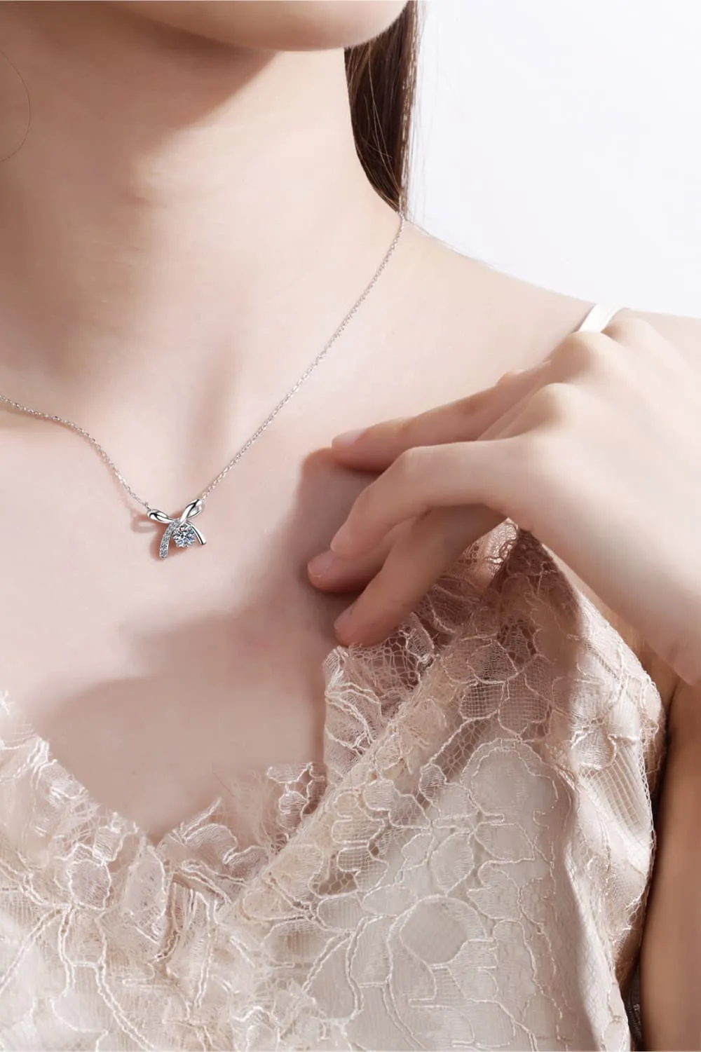Moissanite set in Sterling Silver - Bow Pendant Necklace