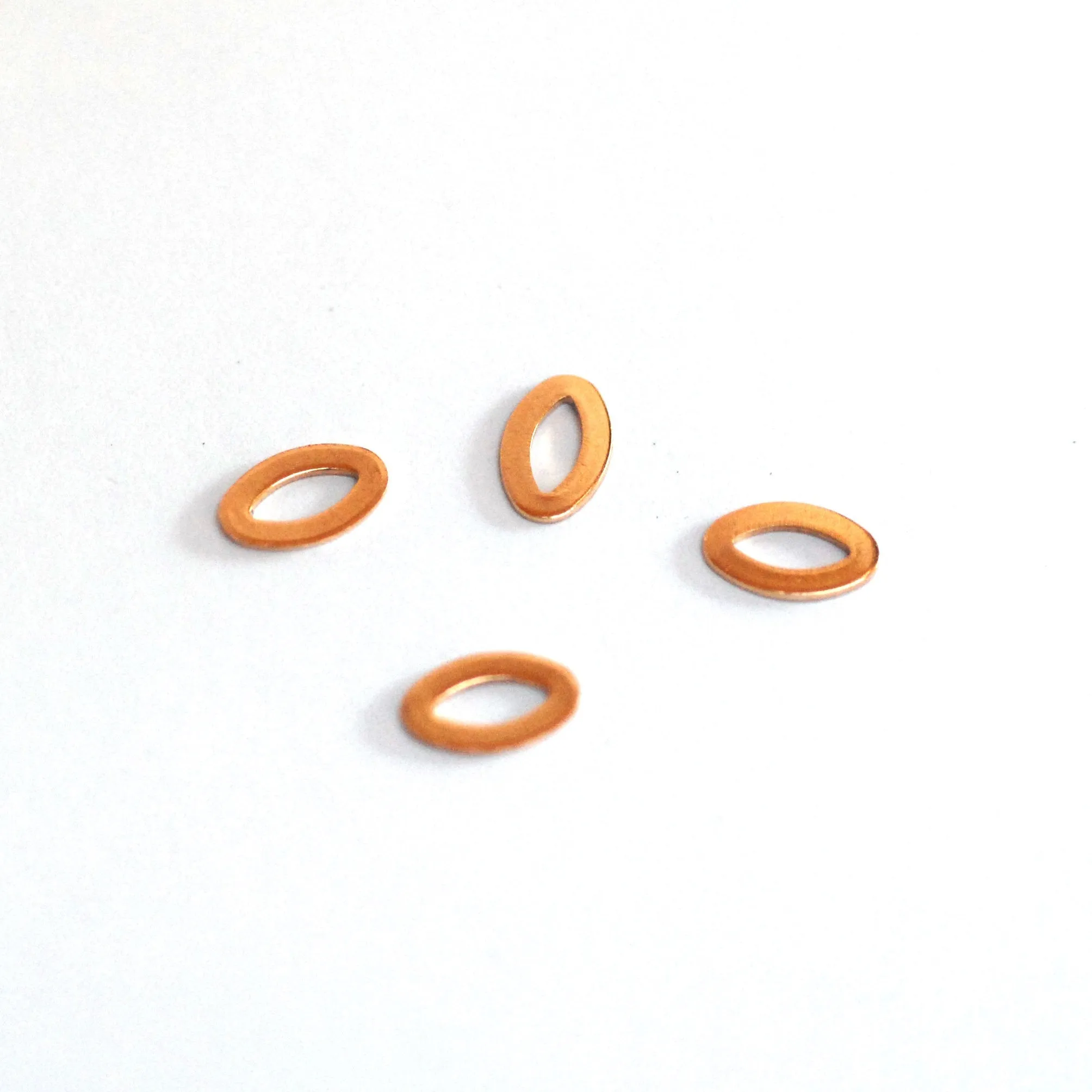 Tiny eye shaped donuts for making jewelry, earring charms, very small, copper, brass, bronze
