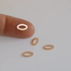 Tiny eye shaped donuts for making jewelry, earring charms, very small, copper, brass, bronze